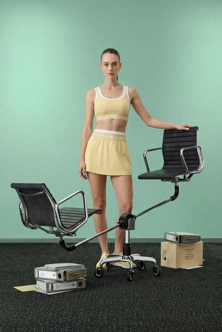 The set in Yellow, standing among office chairs